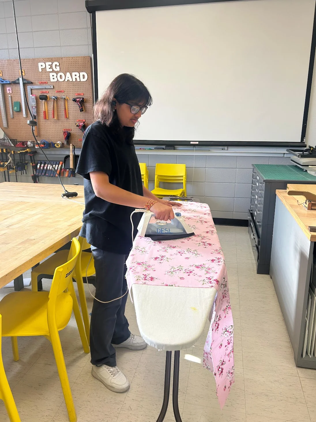 Me ironing fabric
